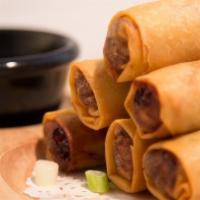 Vegetable Spring Rolls (4) · Crispy Thai-style vegetarian spring rolls served with a delicious sweet & sour sauce.