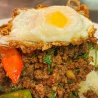 Wagyu Beef Ka Pow Over Rice With Fried Egg · 10oz of American Wagyu grounded beef stir-fried with thai chili, garlic, bell pepper, thai h...