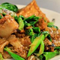 Pad See Iew · Stir-Fried wide rice noodles with egg, Chinese broccoli in Thai sweet soy sauce.