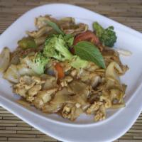 Pad Kee Mow Noodle · Stir-Fried wide rice noodles with egg, bamboo shoots, bell pepper, tomato and basil leaves i...