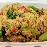 Thai Fried Rice · Fried rice with egg, Chinese broccoli, onion, and tomato.