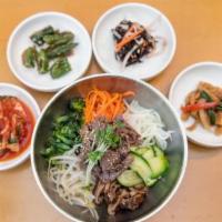 Bibimbap · Cold vegetables with hot rice on the side.