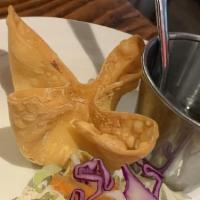 Crab Puff · Deep-fried stuffed wonton with cream cheese, imitation crab meat, and mixed veggies served w...