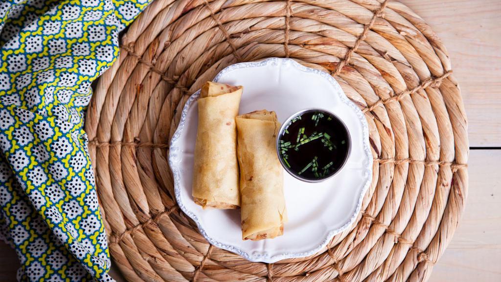 Fresh Vegetable Spring Rolls (2) · 2 egg rolls filled with vegetables and served with dipping sauce.