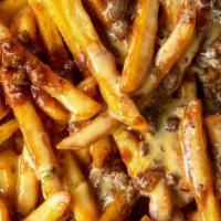 Chili Cheese Fries Deluxe · Delicious fries topped with green chili and cheese. Your choice of meat: Steak, Marinated Po...
