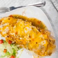 Shredded Beef Burrito · Smothered with green chili. With lettuce, tomato, and cheese.