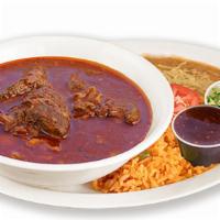 Birria De (Res) (Chivo) · Stew made with blended chile peppers simmered with beef or goat. Served with rice and beans ...