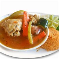 Caldo De Pollo · Served with rice, jalapeño, onions, cilantro and lime on the side.