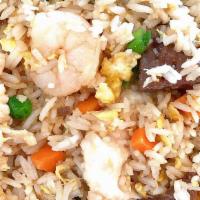 House Special Fried Rice · Shrimp, chicken and beef mixed with eggs, peas and carrots