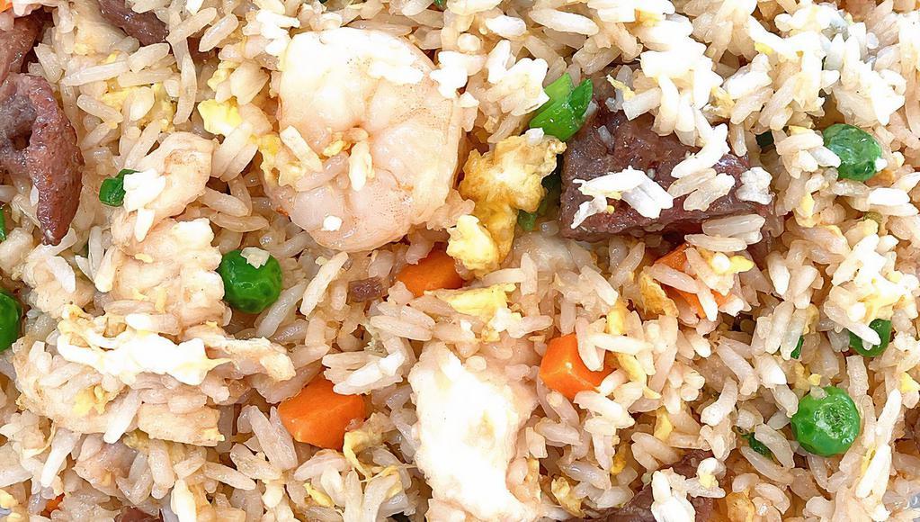 House Special Fried Rice · Shrimp, chicken and beef mixed with eggs, peas and carrots