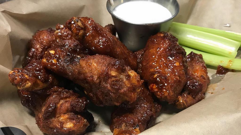 6 Piece Wings · Served with blue cheese and a choice of style.
