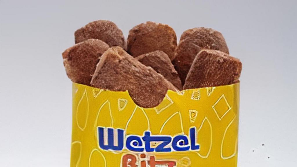 Cin-A-Bits · Bite-sized pretzels tossed in cinnamon sugar for the perfect sweet treat. Don't forget the caramel dip.