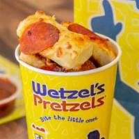 Pizza Bits · A slice of pepperoni and a sprinkle of three-cheese blend top each of our pizza Bits. Add pi...