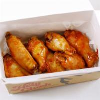 Apricot Chipotle Wings · It's smoky, sweetie. A blend of sweet apricot preserves and a sweet, smoky kick from chipotl...