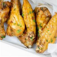 Sweet Thai Chili Wings · Thai glaze with fresh fresno peppers and chopped green onion.