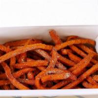 Sweet Potato Churro Fries · Sweet potato fries tossed with cinnamon and sugar.