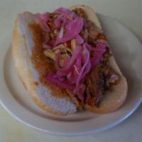 Cochinita Pibil Torta · Roasted pork with red onions. Served on a crusty white sandwich roll.