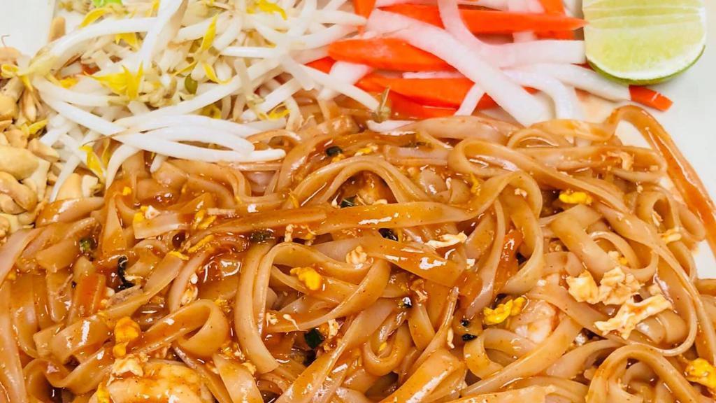Pad Thai · Choice of chicken, beef, tofu, shrimp or combination. Stir-fried with noodles, egg, green onions, bean sprouts and peanuts topped.