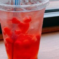Berry Hibiscus · Served with fresh strawberries and popping boba