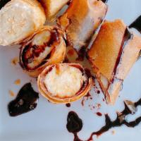Banana Rolls  · Include 3 rolls filled with chocolate and cream cheese. Servers with chocolate sauce. Very r...