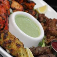 Mixed Kabob Platter · Served without rice. Heavenly platter of all our kabobs; chicken tandoori, seekh kabobs, bot...