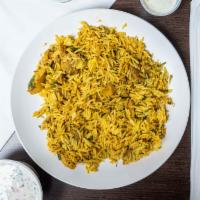 Chicken Biryani · Heavenly tasting, the most famous royal entrée of rice pilaf cooked with marinated juicy and...
