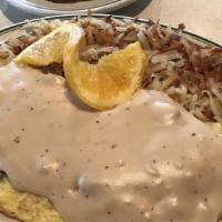 Country Omelet · Sausage and Cheddar filled, topped with homemade country gravy. The state of Oregon would li...
