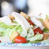 Chicken Caesar Salad · Romaine Lettuce, Tomatoes, Grilled Chicken Breast, Parmesan Cheese, Served with Pack of Crou...