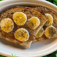 Banana Honey Almond · Whole grain toast, almond butter, banana, chia seeds, honey drizzle.
