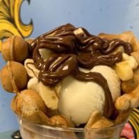 The Elvis · Vanilla waffle, single scoop vanilla gelato, nutella, banana.