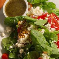 Spinach (Gf) · Baby spinach, roasted pine nuts, tomato, feta, with our honey poppy-seed dressing. Gluten-fr...
