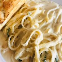 Fettuccine Alfredo · Pasta and house alfredo (made to order).