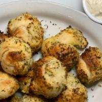 Garlic Knots · Served with  1 Ranch and 1 Marinara or you can select your preference of  (2) of the same.