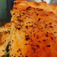 Spinach Dip Calzone · Our creamy spinach and artichoke dip with baked chicken and house-roasted green chilies (no ...