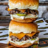 Cheeseburger Sliders · cheddar, housemade 1000 island, pickle