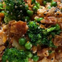 Kimchi Pasta Salad  · Elbow Noodles, Kimchi sauce, Broccoli, English peas, Coconut bacon, Sesame Seeds    **not av...