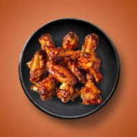 Billy'S Barbecue Wings · 6 golden fried wings in Billy's Smoked Barbecue sauce. Served with a side of blue cheese or ...