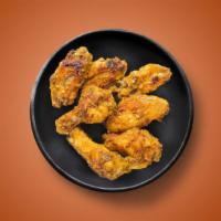 Dirty Dancing · 6 golden fried wings in a magic mango habanero sauce. Served with a side of blue cheese or r...