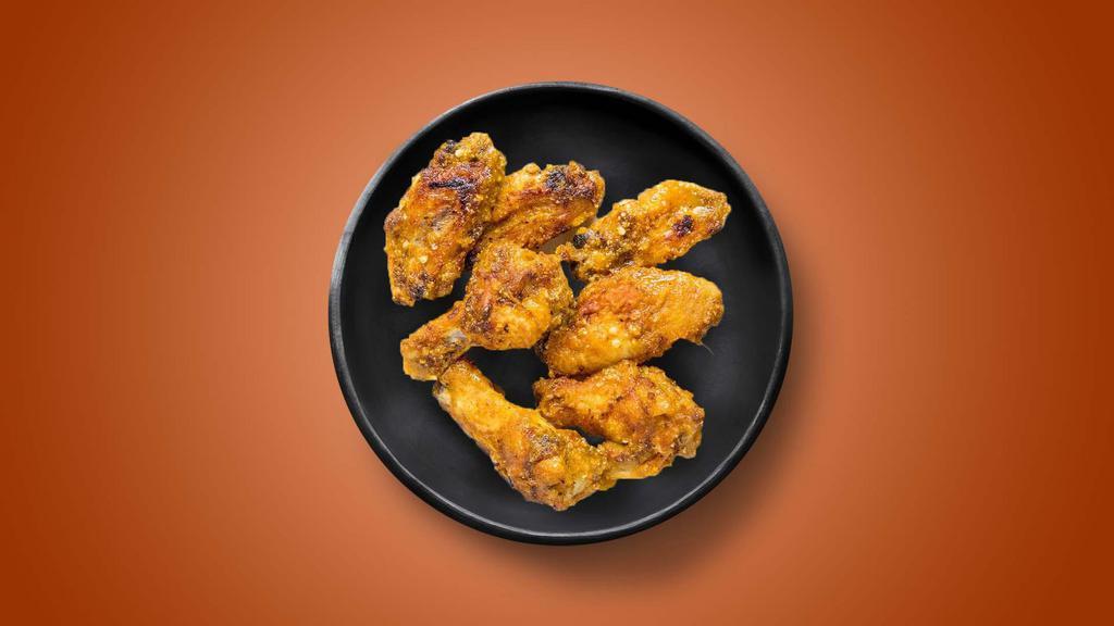 Dirty Dancing · 6 golden fried wings in a magic mango habanero sauce. Served with a side of blue cheese or ranch.