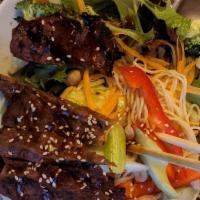 Thai Beef Salad · Plank steak strip with lime juice, chili paste, red onion, green onion, fresh cilantro serve...
