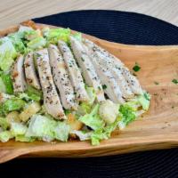 Chicken Caesar Salad · Grilled chicken breast, romaine, croutons, Caesar dressing, and Parmesan cheese.