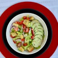Side House Salad · Romaine, cucumber, red onion, Roma tomato, croutons, and Italian dressing.