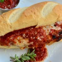Chicken Parmesan Sub · Breaded and fried chicken breast, house-made marinara, melted mozzarella on toasted bun.