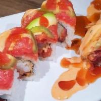 Tiger Roll · Top Spicy Tuna, Shrimp Tempura, Cucumber, Avocado.