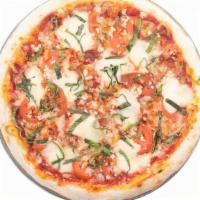 Queen · Fresh Mozzarella, fresh Basil, crushed Garlic and Tomatoes