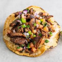 Carne Asada Taco · Seasoned Carne Asada taco meat, pepper jack cheese, red onion, pico de gallo, cilantrom and ...