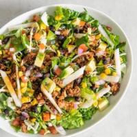 Chipotle Crunch Salad · Tex-mex taco meat, lettuce mix, cabbage, ranchero beans, jicama, pico de gallo, tortilla str...