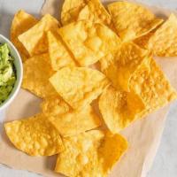 Chips + Guacamole · Crispy tortilla chips served with  house-made guacamole. Gluten-friendly. .