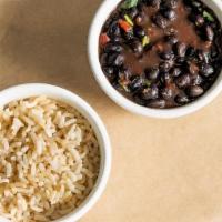 Brown Rice + Beans · Side on brown rice and black ranchero beans. Gluten-friendly. .