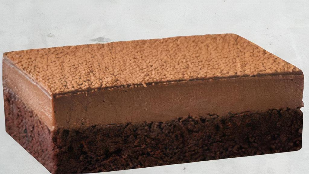 Belgian Chocolate Cake · Layer of chocolate cake, chocolate cheesecake, and fudge topping